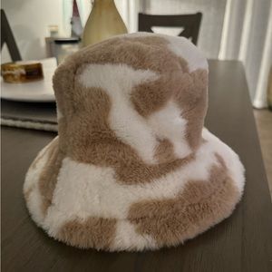 Cow print bucket hat.